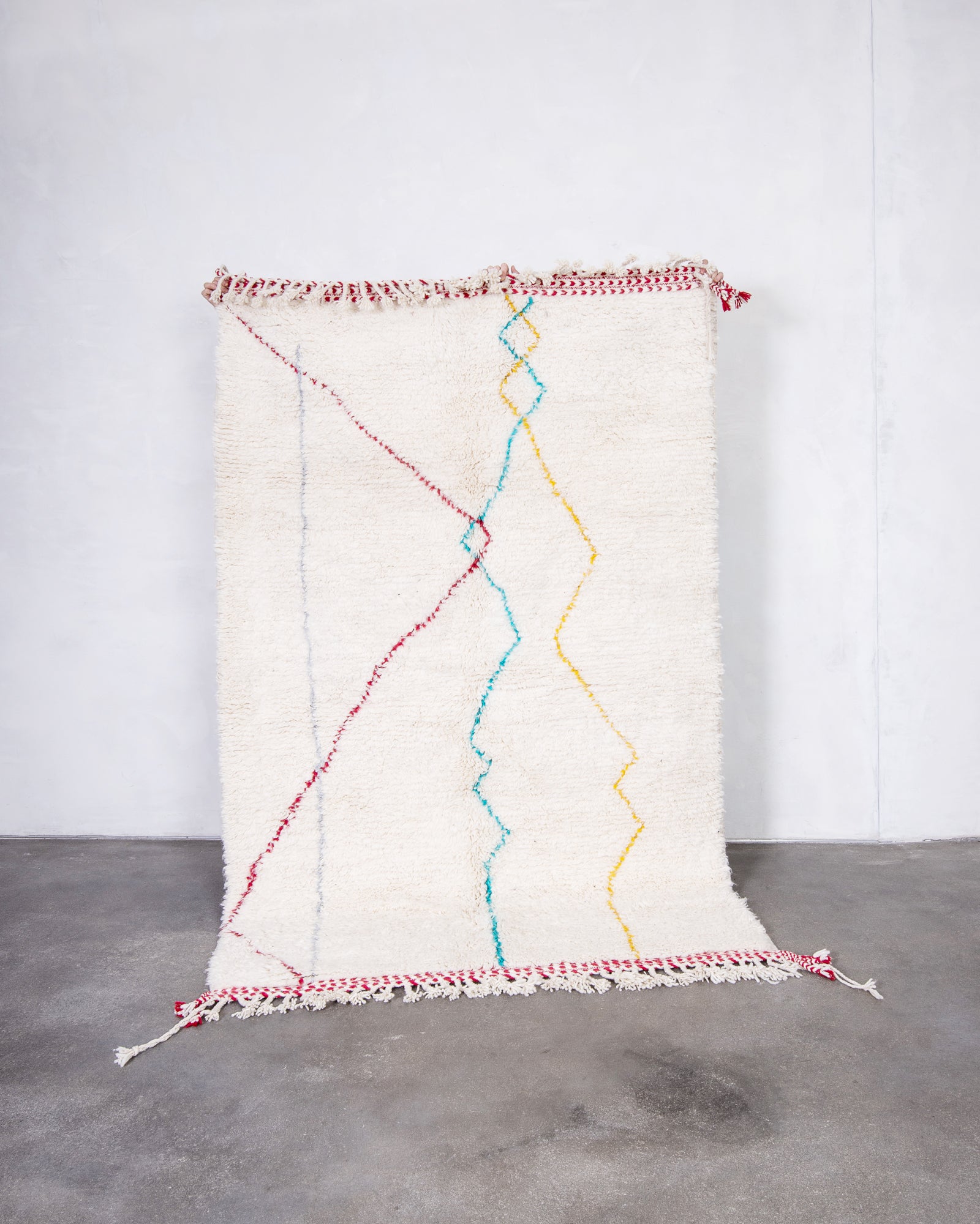 Modern, designer, handcrafted Berber rug from Morocco. Beniourain carpet with beautiful colours and patterns and fluffy wool texture.
